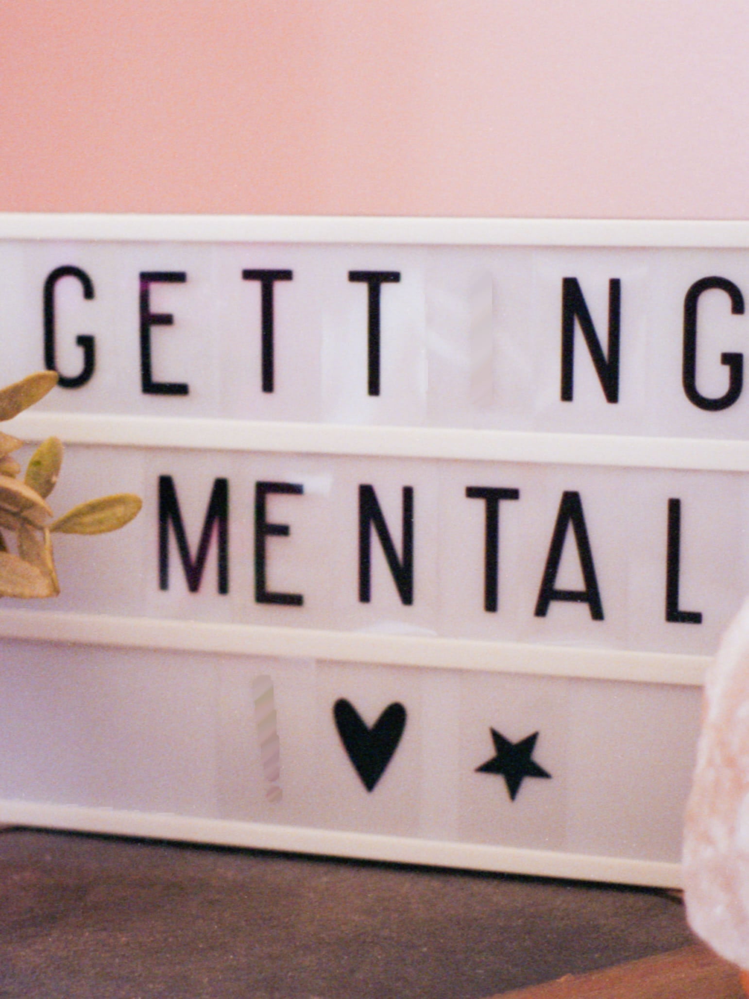 A sign for the Getting Mental podcast by Brenda Sarai Zuniga